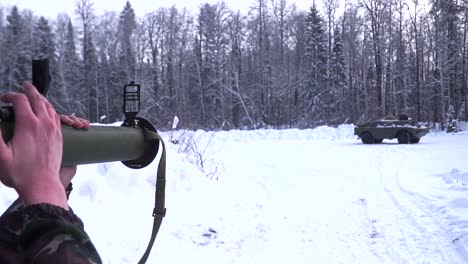 military training exercise in snowy terrain