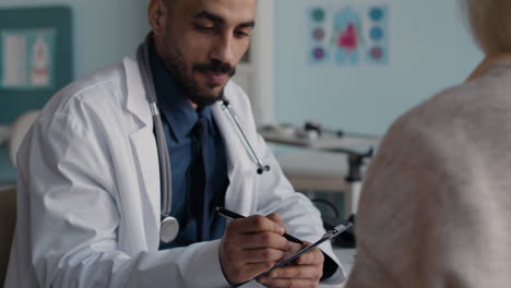 doctor consulting with patient in clinic