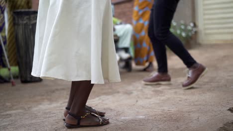 Two-people-dancing-a-traditional-dance-in-Rwanda,-slow-motion