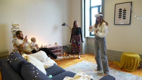 familia jugando a un juego de realidad virtual en casa