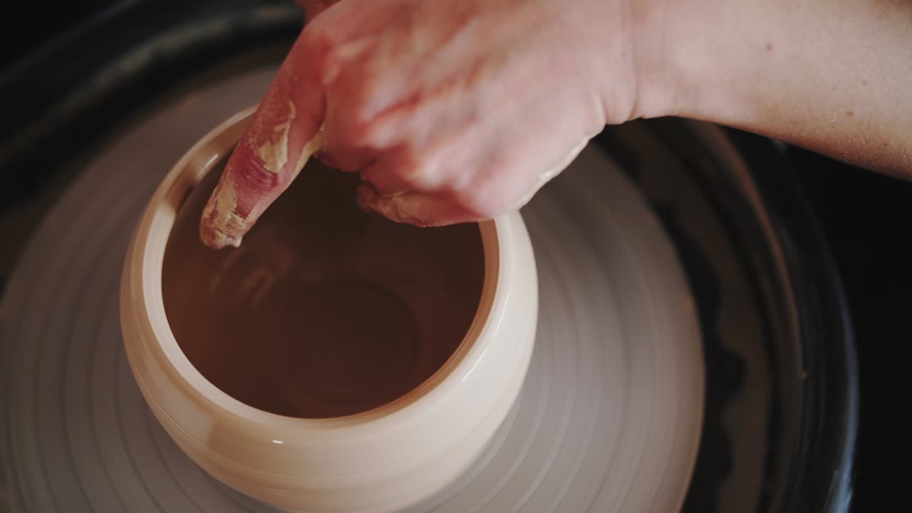 footage of pottery wheel work