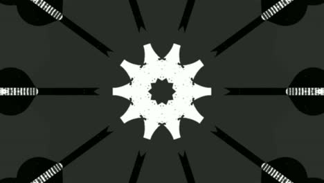 motion graphic of black and white designs popping from the center and fading, isolated on black background