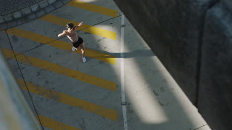 dancing woman young hispanic street dancer performing contemporary moves in city enjoying urban freestyle dance top view