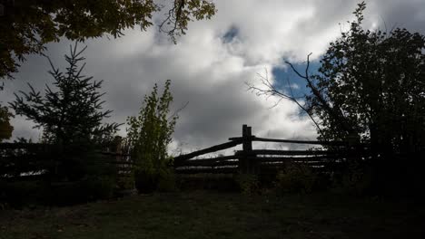 watching heavy clouds pass from backyard. time lapse