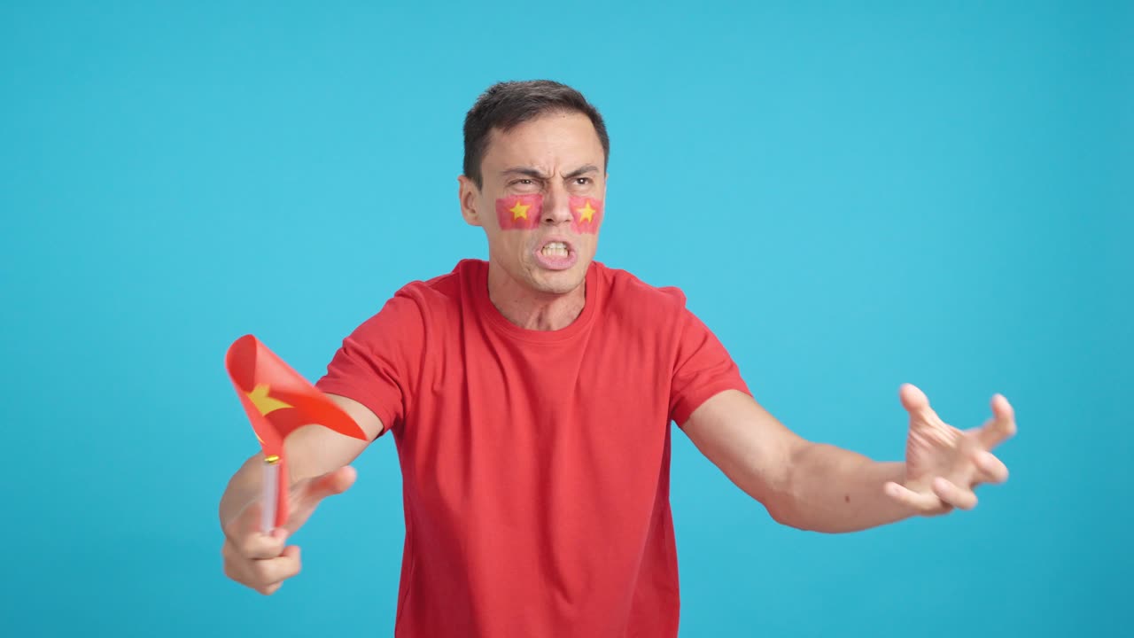 Man Cheering for Vietnam, angry with the decision of referee