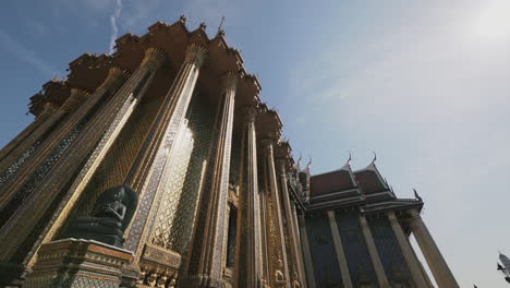 mid-day glistening parallax shot on the temple of the emerald buddha in bangkok, thailand.