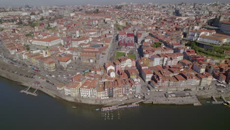 Aerial-trucking-shot-with-a-stunning-panorama-of-the-Porto-Old-Town-and-Douro-River