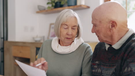 document, discussion and senior couple with stress