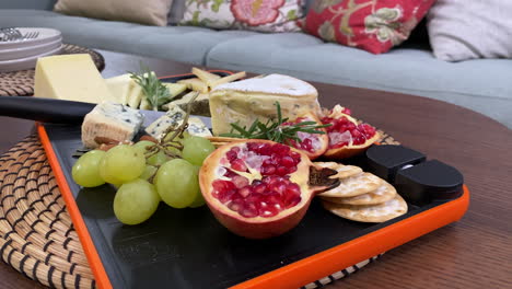 colorful cheese plate on dining room table