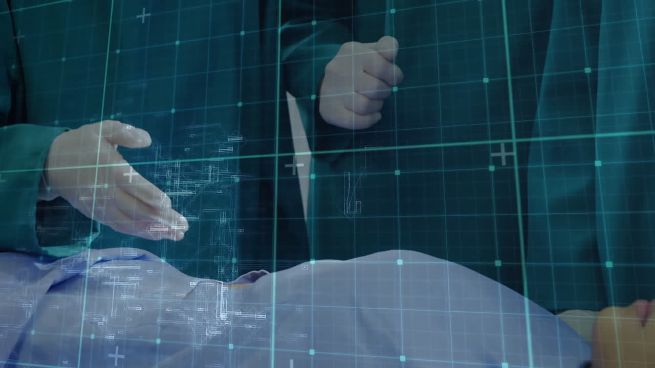 In hospital, medical professional using animation holographic interface with patient