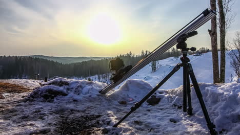 camera equipment taking timelapse of a snowy landscape