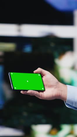 vertical video focused person connecting on social platforms next to mockup screen