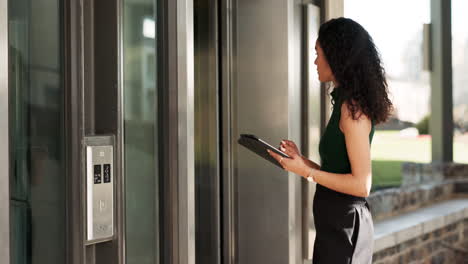 elevator button, woman typing