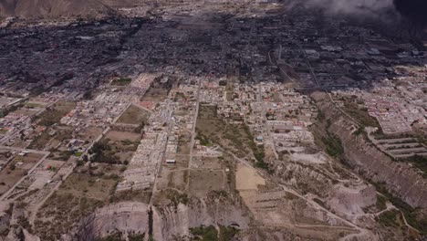 Aerial-flying-high-above-San-Antonio-de-Pichincha,-Ecuador,-South-America