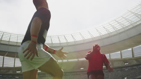 rugby players playing rugby match in stadium 4k