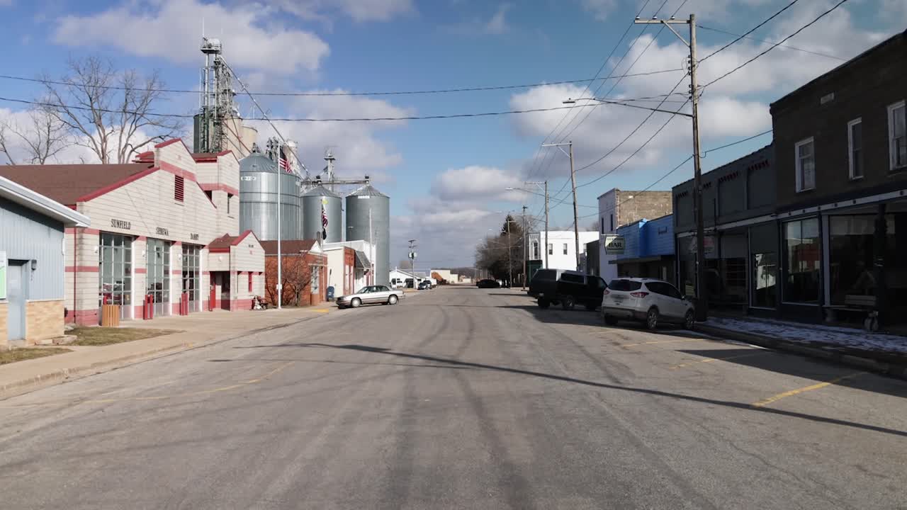 Downtown Sunfield, Michigan with gimbal video walking forward.