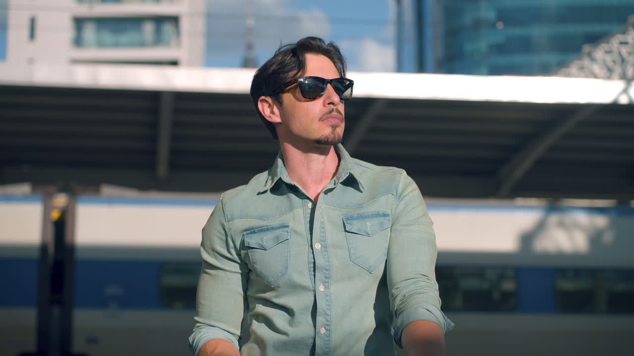 Man Traveler Waiting Train At Seoul Railway Station, Looking left and right directions on Sunny Day