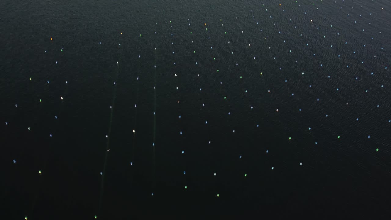 Aerial top down shot of mussel farms, ocean farming in the Mediterranean.