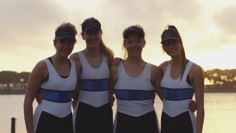 female rowing team training on a river