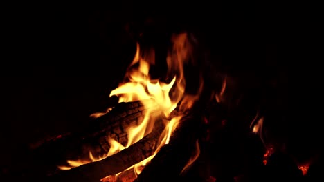 orange flames on black background, close up of fireplace