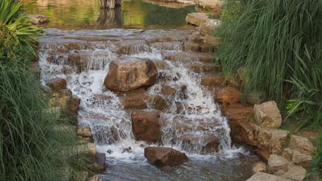 beautiful cascading waterfall in a garden