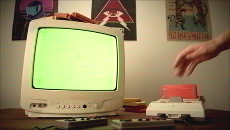 retro gaming setup with vintage tv and consoles