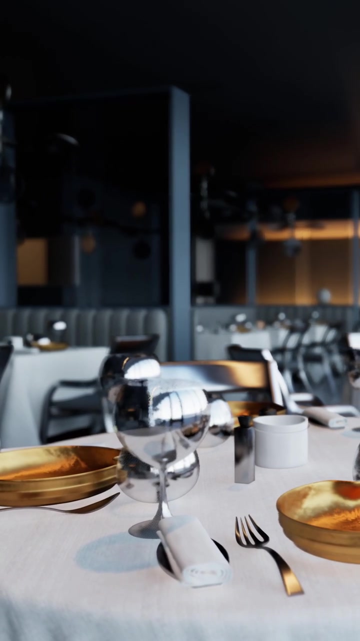 Imbanditura della tavola in un ristorante moderno con piatti eleganti e cristalleria.