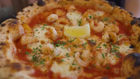 delicious prawn pizza with lemon slice