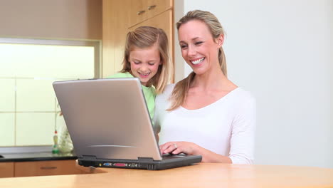 Woman-choosing-a-recipe-with-her-daughter