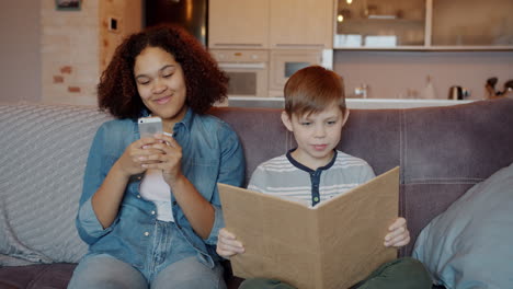 children using technology and reading together at home