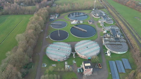 aerial of large water tanks at sewage treatment plant
