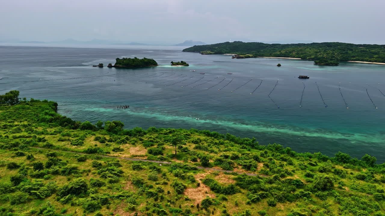 Panoramic aerial view of the Pink Beach in Lombok, officially known as Tangsi Beach