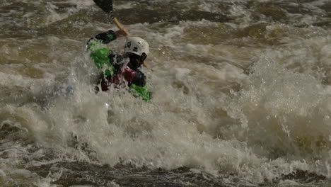 Paddling-white-water-rafting-extreme-sports-in-a-kayak