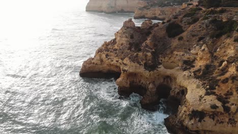 atlantic ocean waves washing on rock cliffs