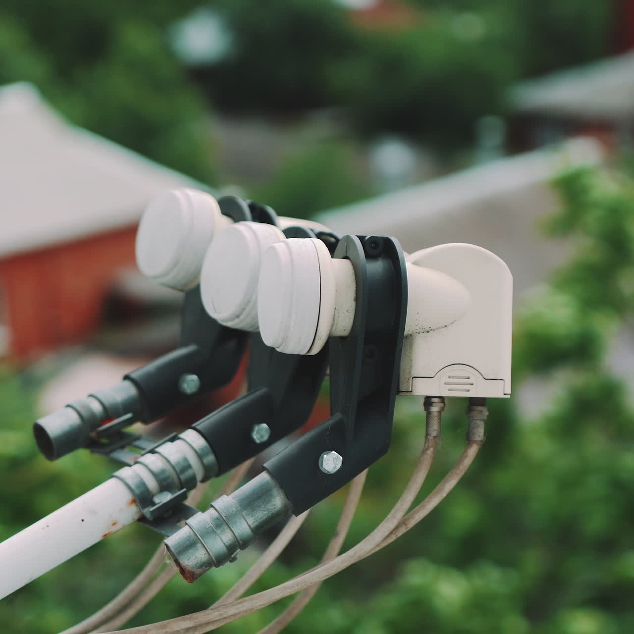 Satellite dish converter device. Television satellite dish. Close up.