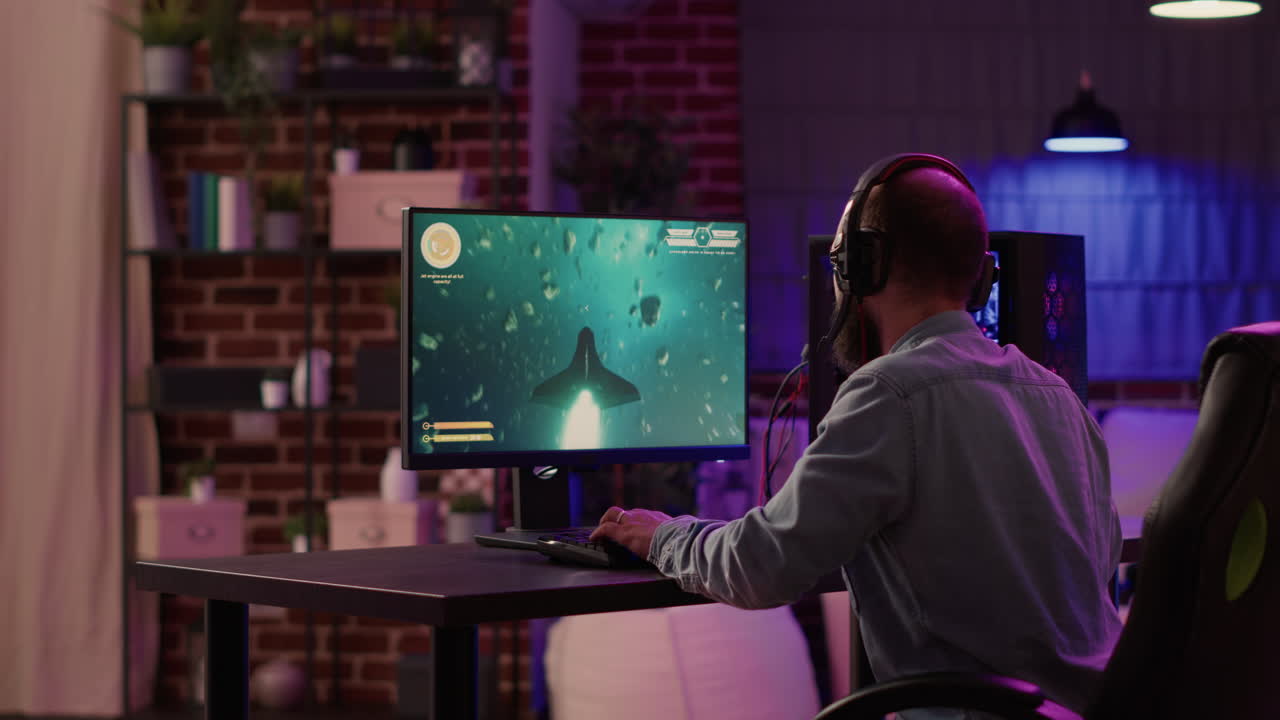 Gamer feeling disappointed after losing difficult level in online space shooter on gaming pc