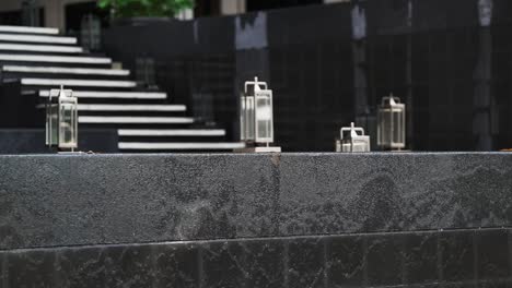 stunning grey hotel staircase with cascading water feature, beautiful entrance