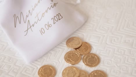 close up coin bag for wedding, decoration with names and date