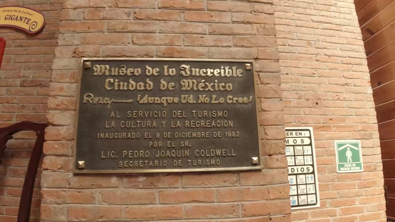 Ripley Museum of Mexico Sign and objects at entrance hall, pan left