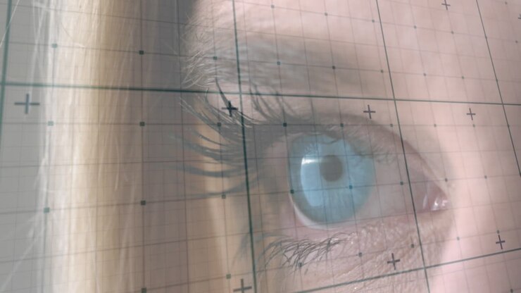 Animation of data processing over eye of caucasian woman