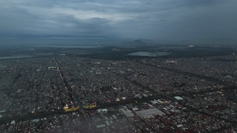 Overcast and grey day in Valley of Mexico, drone flying above Ecatepec