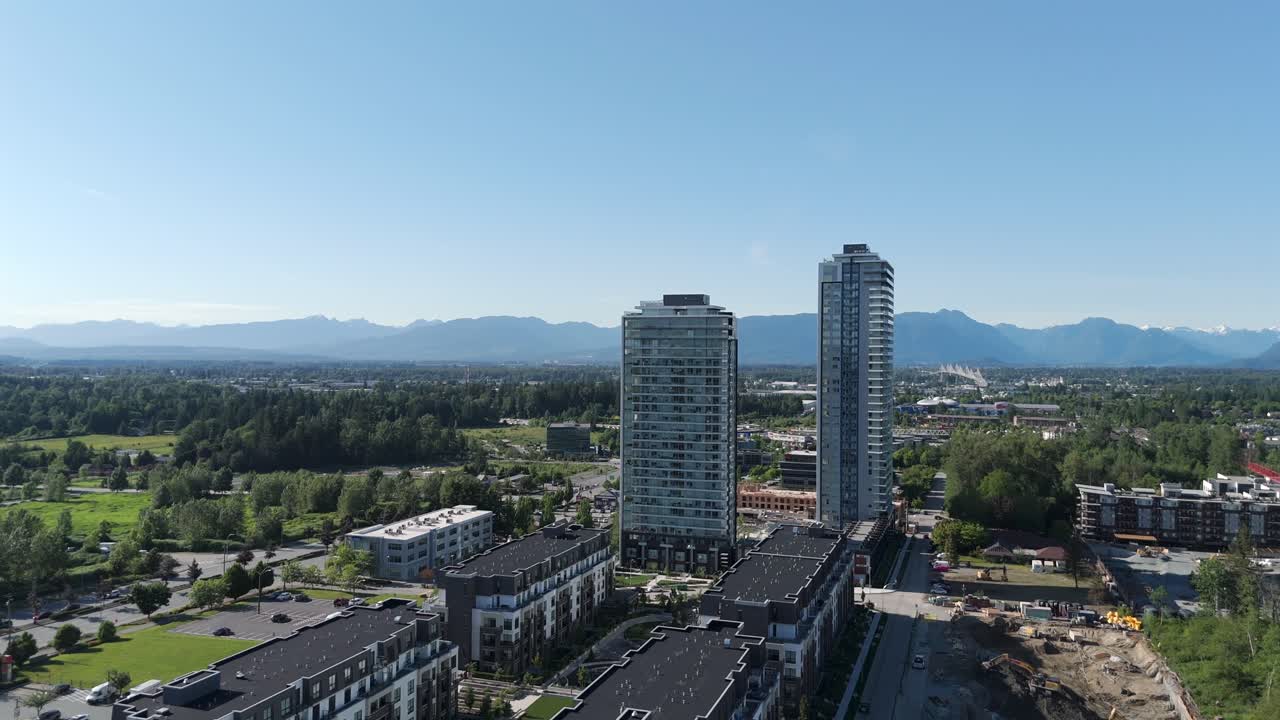 Rising Apartments And Condominiums Complex Over Willoughby Suburban Area With Langley Township, British Columbia, Canada. Aerial Drone Shot