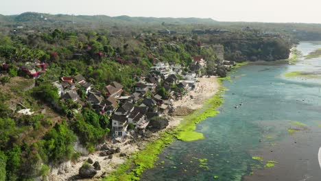 the town of bingin at the cliffs of uluwatu during low tide