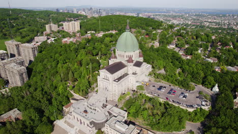 drone shot tilting toward the saint joseph's oratory of mount royal in montreal