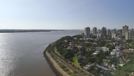 A-drone-shot-of-the-beautiful-coastal-city-of-Posadas,-Argentina