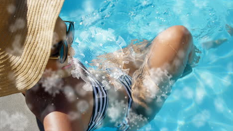 video compuesto digital de células de covid-19 moviéndose contra una mujer sentada en una piscina