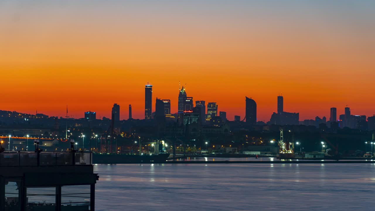 Timelapse of Boats Navigating the Bosphorus Strait Against the Backdrop of Istanbul&rsquo;s Skyline At Sunrise
