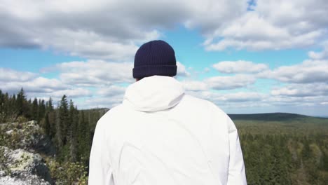 man hiking in mountains