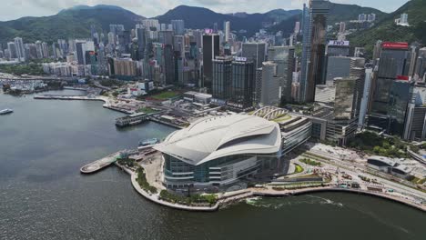 aerial of the hong kong convention and exhibition centre and city skyline, wan chai, hong kong, china