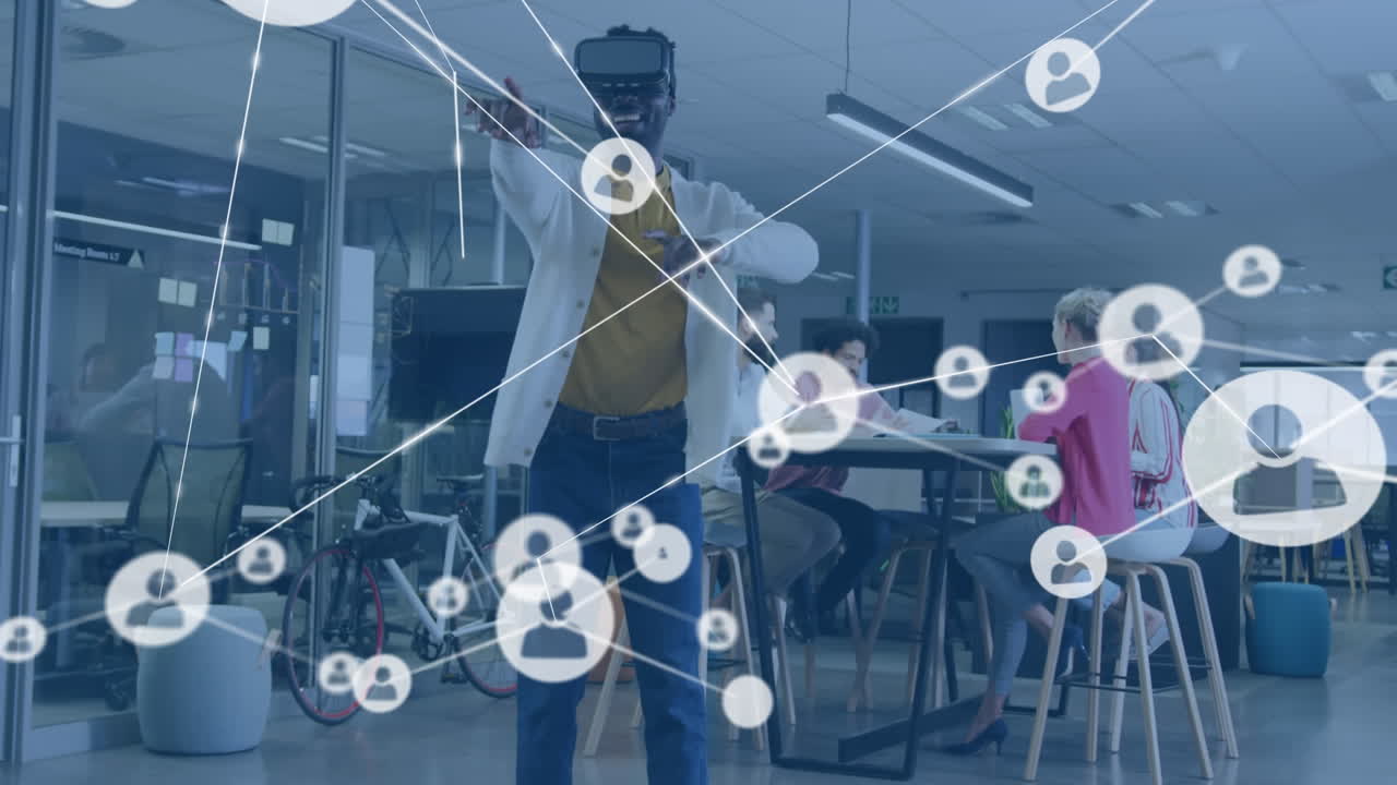 animación de la red de iconos de perfil contra el hombre afroamericano que usa auriculares vr en la oficina.